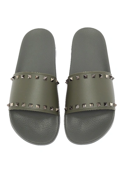 Shop Valentino Garavani Rockstud Slide Sandals In Khaki Green
