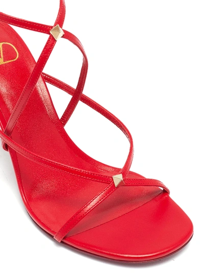 Shop Valentino Rockstud Cross Strap Leather Sandals In Rouge