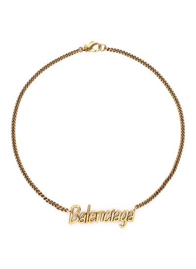 Shop Balenciaga 'typo' Logo Pendant Necklace In Gold