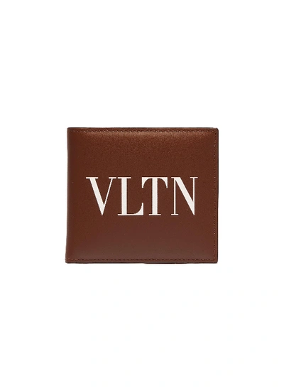 Shop Valentino Garavani Logo Print Leather Bifold Wallet In Brown