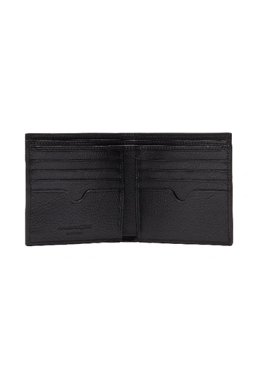 Shop Alexander Mcqueen Stud Skull Leather Bi-fold Wallet In Black