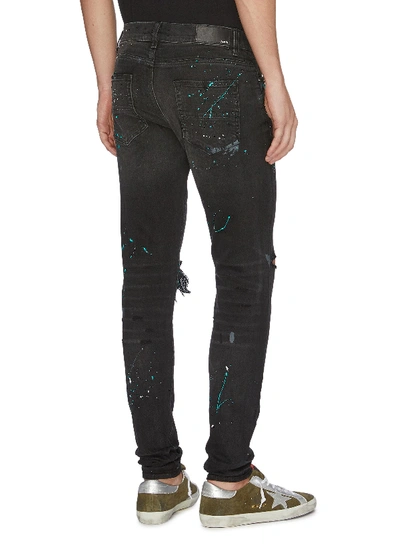 Shop Amiri 'graffiti' Paint Splatter Print Ripped Jeans In Black