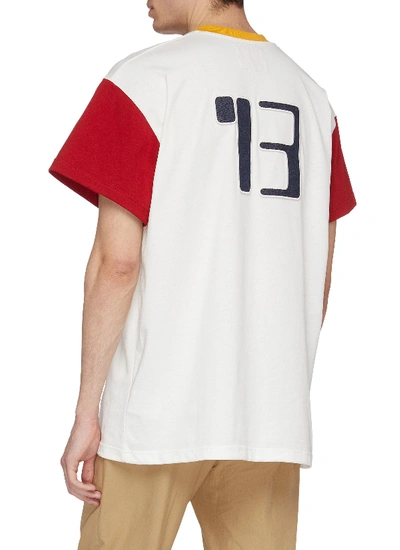 Shop Acne Studios Abstract Appliqué Slogan Print Colourblock T-shirt