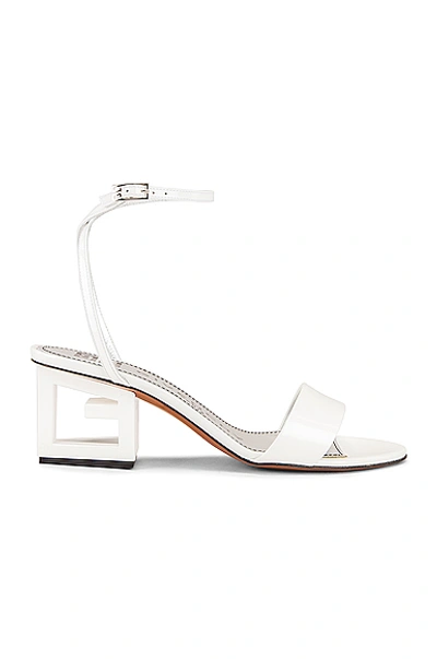 Shop Givenchy Patent Leather Triangle Heel Strap Sandals In Off White