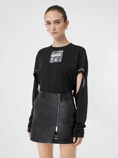 Shop Burberry Cut-out Detail Montage Print Oversized Top In Black