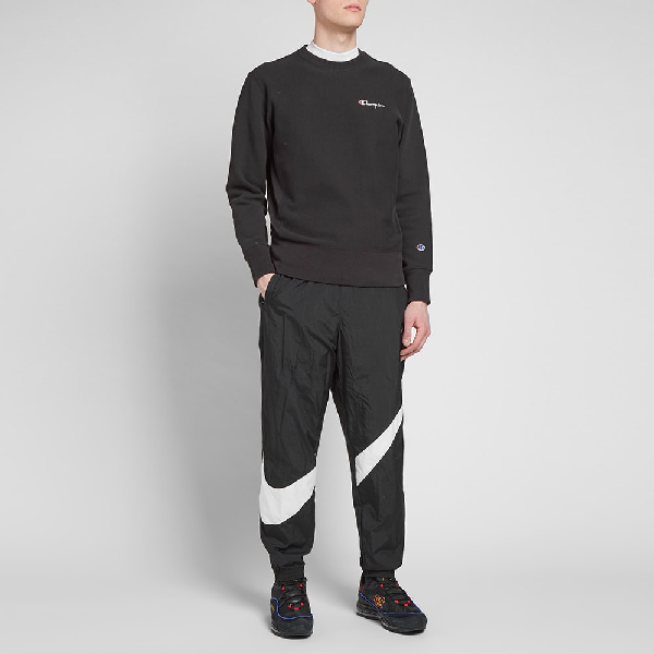 nike big swoosh track pants