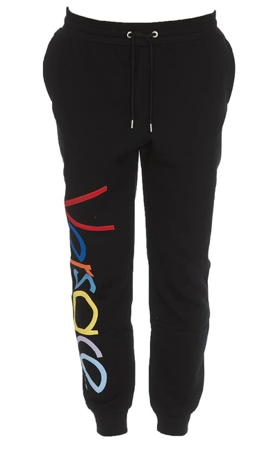 Shop Versace Logo Embroidered Pants In Black