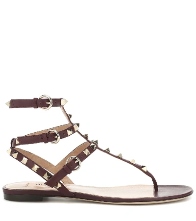 Shop Valentino Rockstud Leather Sandals In Red