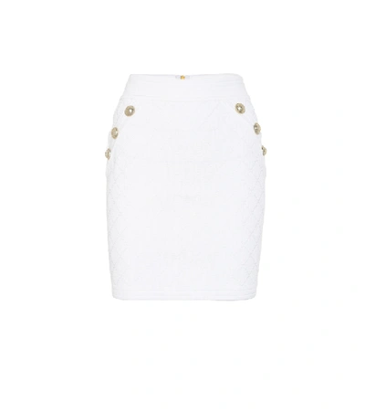 Shop Balmain Embellished Knit Miniskirt In White