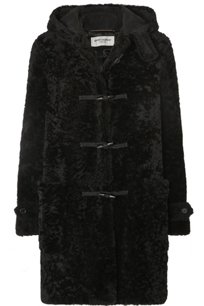 Shop Saint Laurent Hooded Shearling Coat In Black