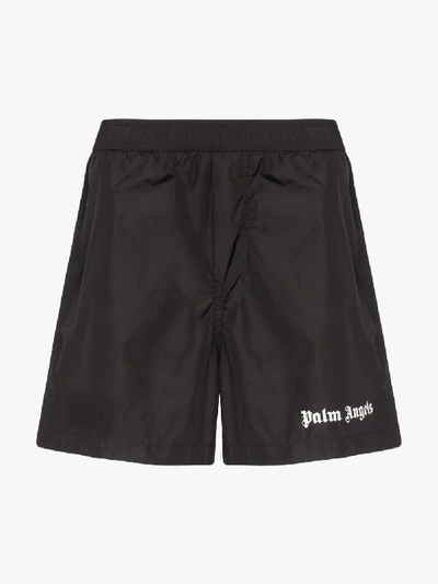 Shop Palm Angels Logo Print Striped Swimming Trunks In Black