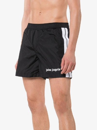 Shop Palm Angels Logo Print Striped Swimming Trunks In Black