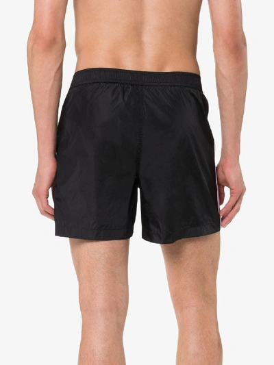 Shop Palm Angels Logo Print Striped Swimming Trunks In Black