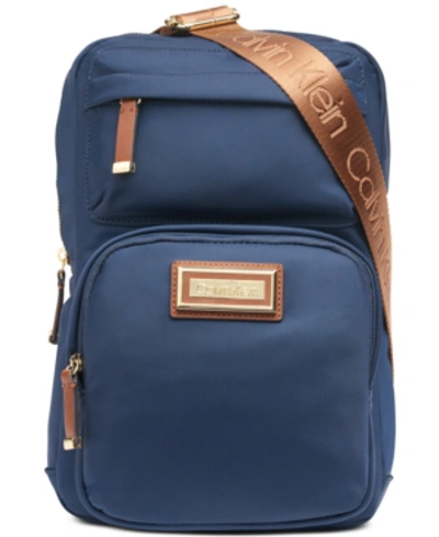 Shop Calvin Klein Belfast Sling Backpack In Navy Combo/gold