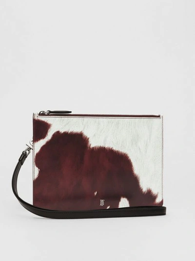 Shop Burberry Cow Print Leather Zip Pouch In Mahogany