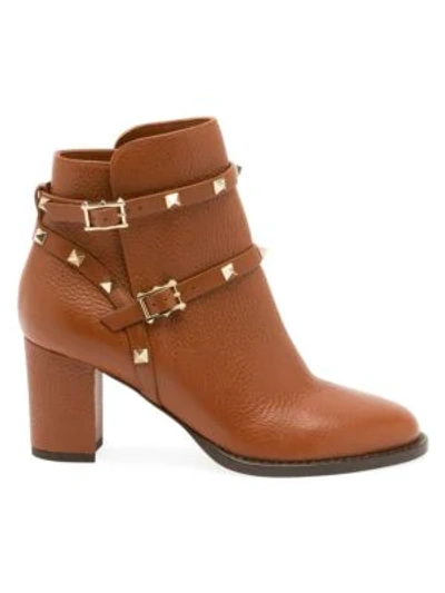 Shop Valentino Rockstud Leather Ankle Boots In Cognac