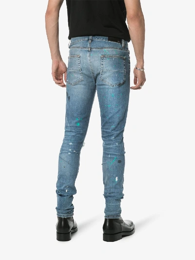 Shop Amiri Paint Splatter Slm Jns Blu In Blue