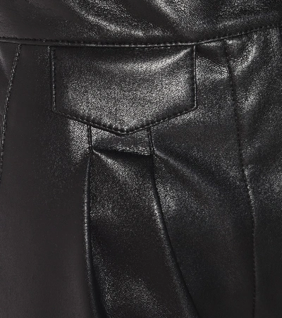 Shop Nanushka Mitsu Faux Leather Pants In Black