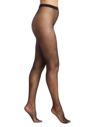 Shop Wolford Wildlife Micro Fishnet Tights In Black