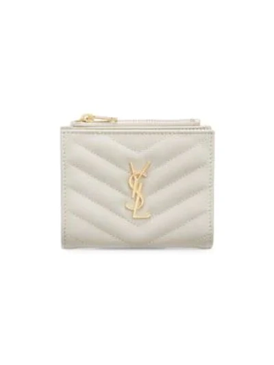 Shop Saint Laurent Monogram Matelass Leather Bi-fold Wallet In Cream