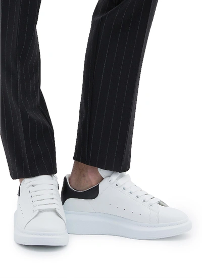 Alexander Mcqueen Exaggerated-sole Leather Sneakers In Jet | ModeSens