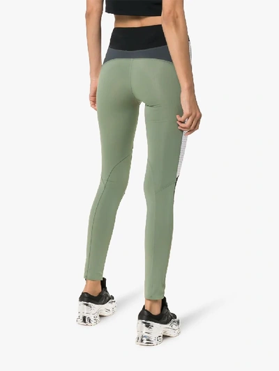 Shop Charli Cohen Laser Colour Block Leggings In Green