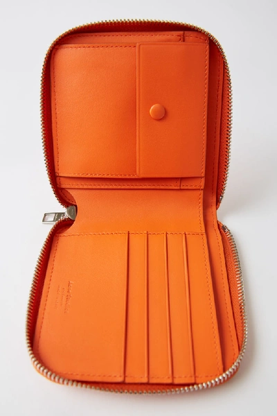 Shop Acne Studios Csarite S Orange In Medium Zip Wallet