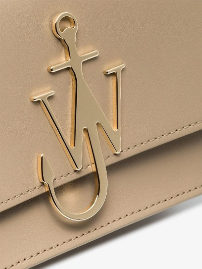 Shop Jw Anderson Logo-plaque Cross-body Bag In Neutrals