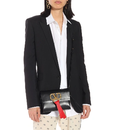 Shop Valentino Vring Leather Crossbody Bag In Black