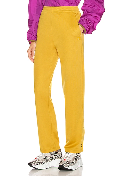 Shop Acne Studios Emmett Face Pant In Yellow In Amber Yellow