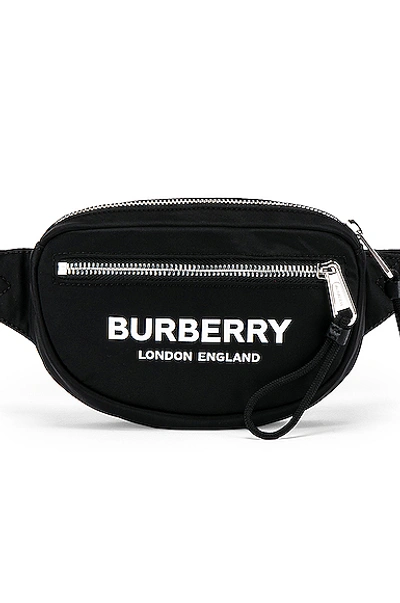 Shop Burberry Cannon Printed Bum Bag In Black