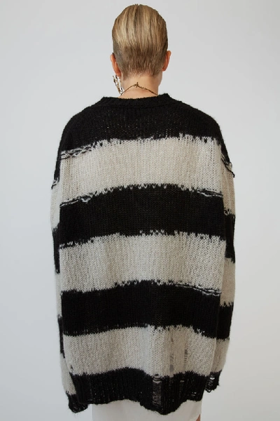 Shop Acne Studios Distressed Striped Sweater Black/grey
