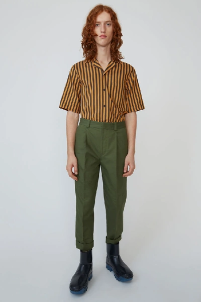 Shop Acne Studios Pleated Trousers Pine Green