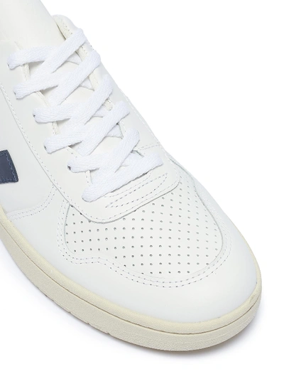 Shop Veja 'v-10' Perforated Leather Sneakers In Extra White / Nautico Pekin