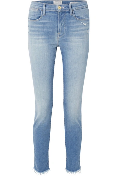 Shop Frame Le High Distressed Skinny Jeans In Mid Denim