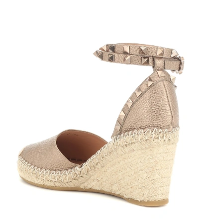 Shop Valentino Rockstud Double Leather Wedge Espadrilles In Metallic