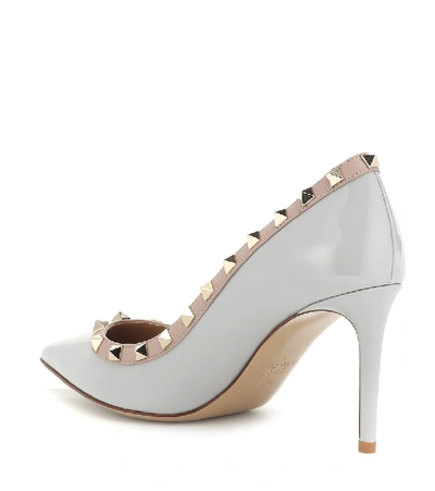 Shop Valentino Rockstud Patent Leather Pumps In Grey