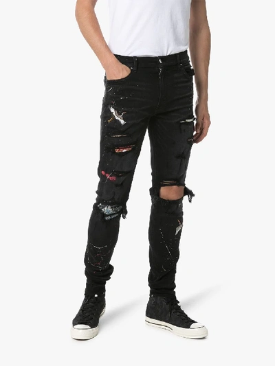 Shop Amiri Distressed Art Patch Paint Splatter Jeans In Black