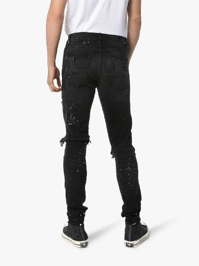 Shop Amiri Distressed Art Patch Paint Splatter Jeans In Black