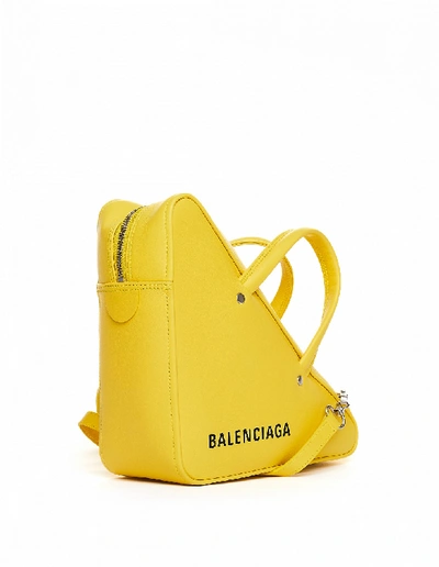Shop Balenciaga Yellow Leather Triangle Duffle S Bag