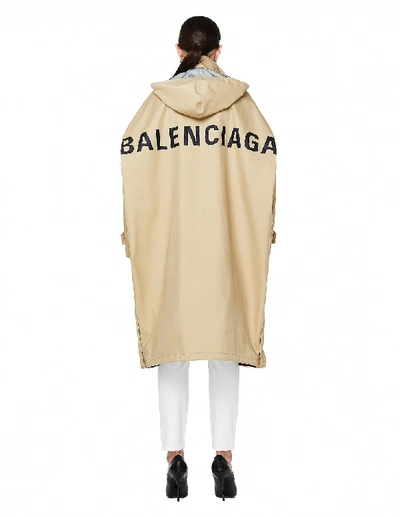 Shop Balenciaga Beige Logo Printed Opera Raincoat