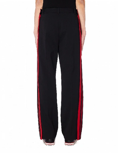 Shop Balenciaga Black & Red Trousers