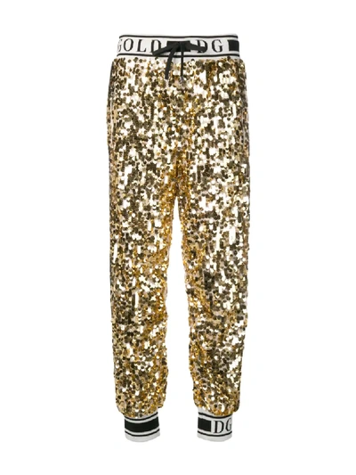 Shop Dolce & Gabbana Side Band Sequin Trousers In Gold