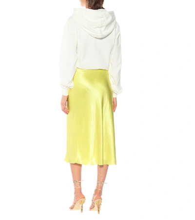 Shop Vince Satin Slip Midi Skirt In Yellow