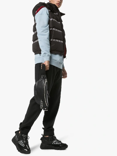 Shop Versace Striped Logo Padded Gilet In Black