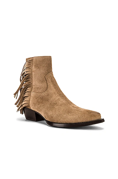 Shop Saint Laurent Lukas Fringe Boots In New Sigaro