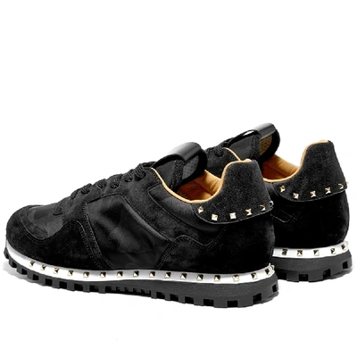 Shop Valentino Stud Sole Rockrunner Sneaker In Black