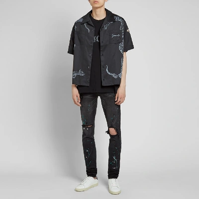 Shop Amiri Paint Splatter Jean In Black