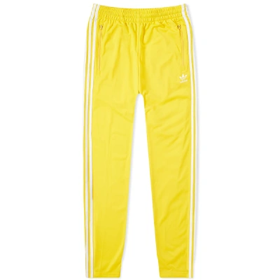 Shop Adidas Originals Adidas Firebird Track Pant In Yellow