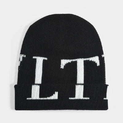 Shop Valentino Vltn Beanie In Black And Ivory Wool